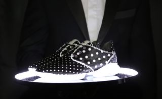 black shoe with white spots