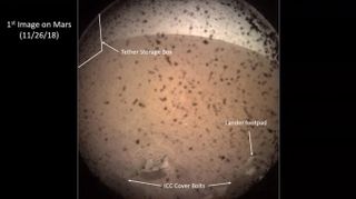 This annotated view of the first Mars photo from NASA's InSight lander shows key parts of the terrain and lander itself after a successful touchdown on Nov. 26, 2018.