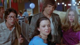 A group of teens at a carnival in the movie the funhouse