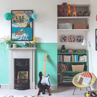 A two-toned playroom with open shelving displaying toys and children's books