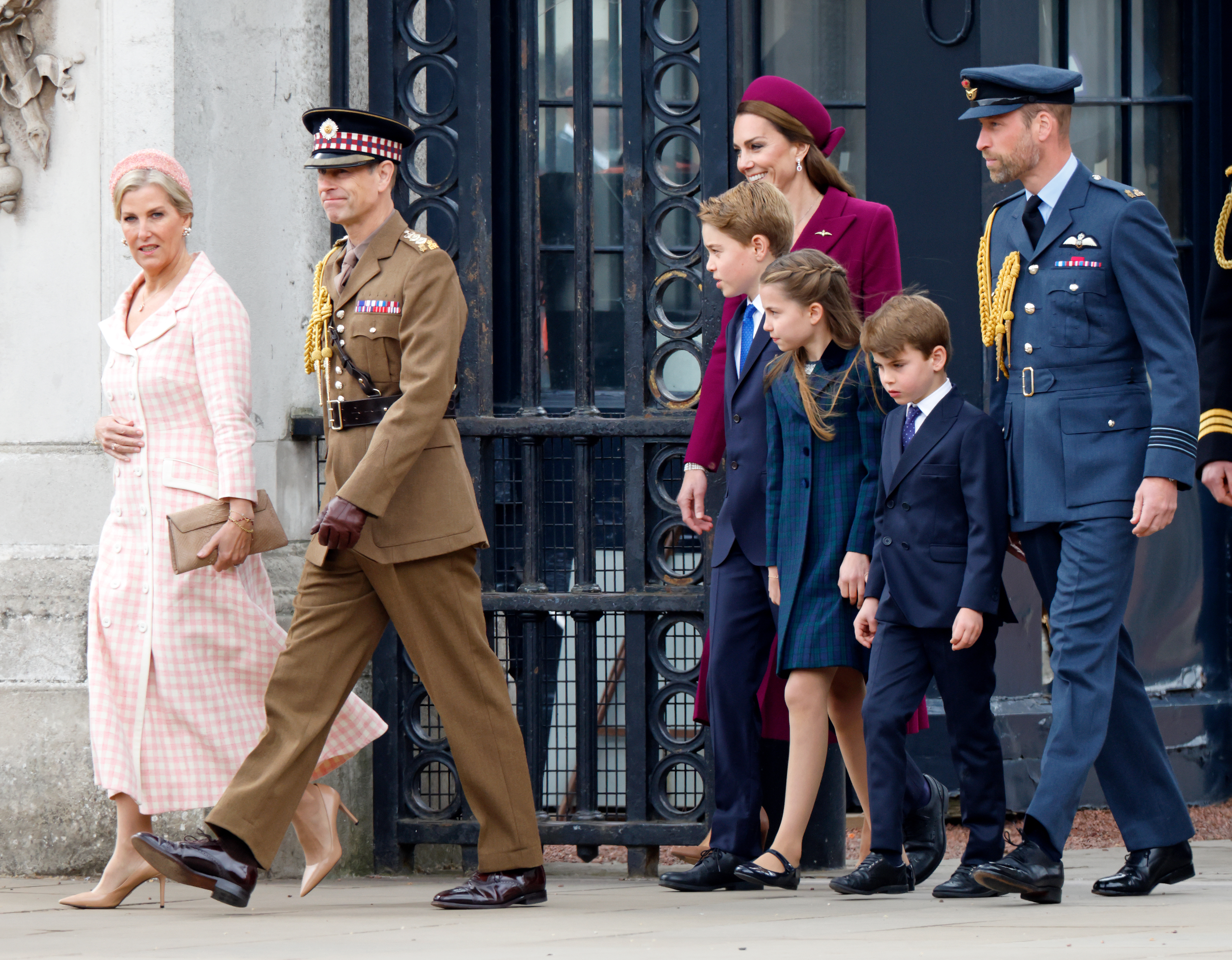 Duchess Sophie, Prince Edward, Princess Kate, Prince William and their kids walking outside Buckingham Palace for VE Day 80