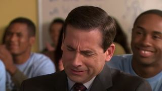 Michael Scott (Steve Carell) cries while visiting students in the episode "Scott's Tots"