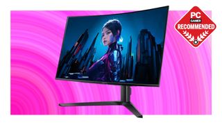 An image of an Acer Predator X32X OLED gaming monitor against a multi-colored pink background, with a white border and a PC Gamer Recommended logo.