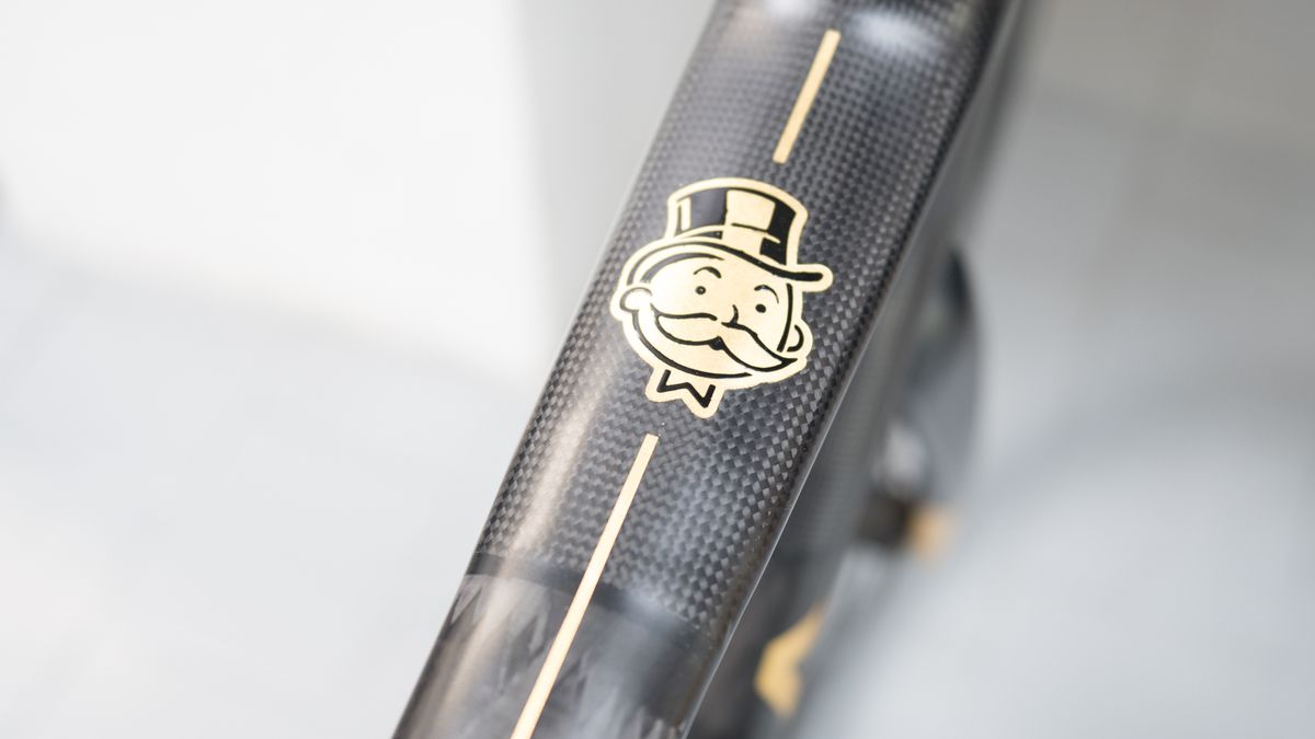 Festka Spectre gold leaf monopoly man top tube logo