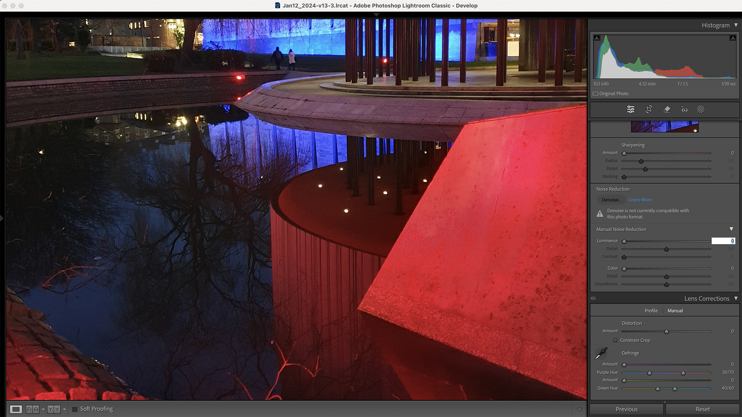 A dark, stylized image showcasing a modern building reflected in water, edited in Adobe Lightroom Classic with various adjustment panels visible