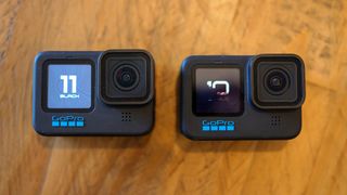 A photo of the GoPro Hero 10 Black and Hero 11 Black side by side