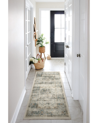 Neutral entryway with white door