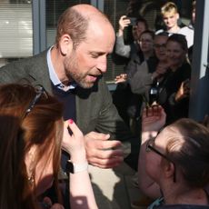 Prince William embraces fan Natasha Gorry during visit to Homewards Bournemouth, Christchurch and Poole (BCP) on February 28, 2025