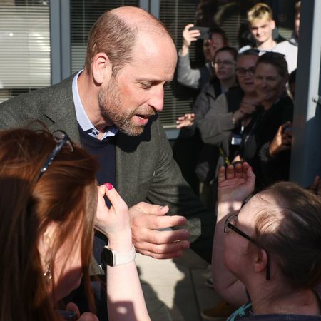 Prince William embraces fan Natasha Gorry during visit to Homewards Bournemouth, Christchurch and Poole (BCP) on February 28, 2025