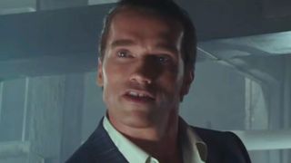Arnold Schwarzenegger with his hair slicked back in Raw Deal