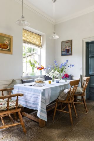 kitchen table with blue cloth in renovated laundry