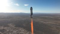 Photo of a Blue Origin New Shepard rocket launching the NS-20 space tourist mission in March 2022.