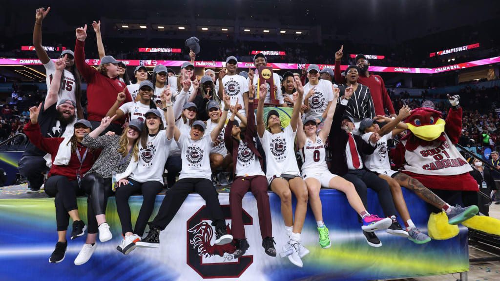 South Carolina Gamecocks players celebrate their win over the Connecticut Huskies on Sunday night.