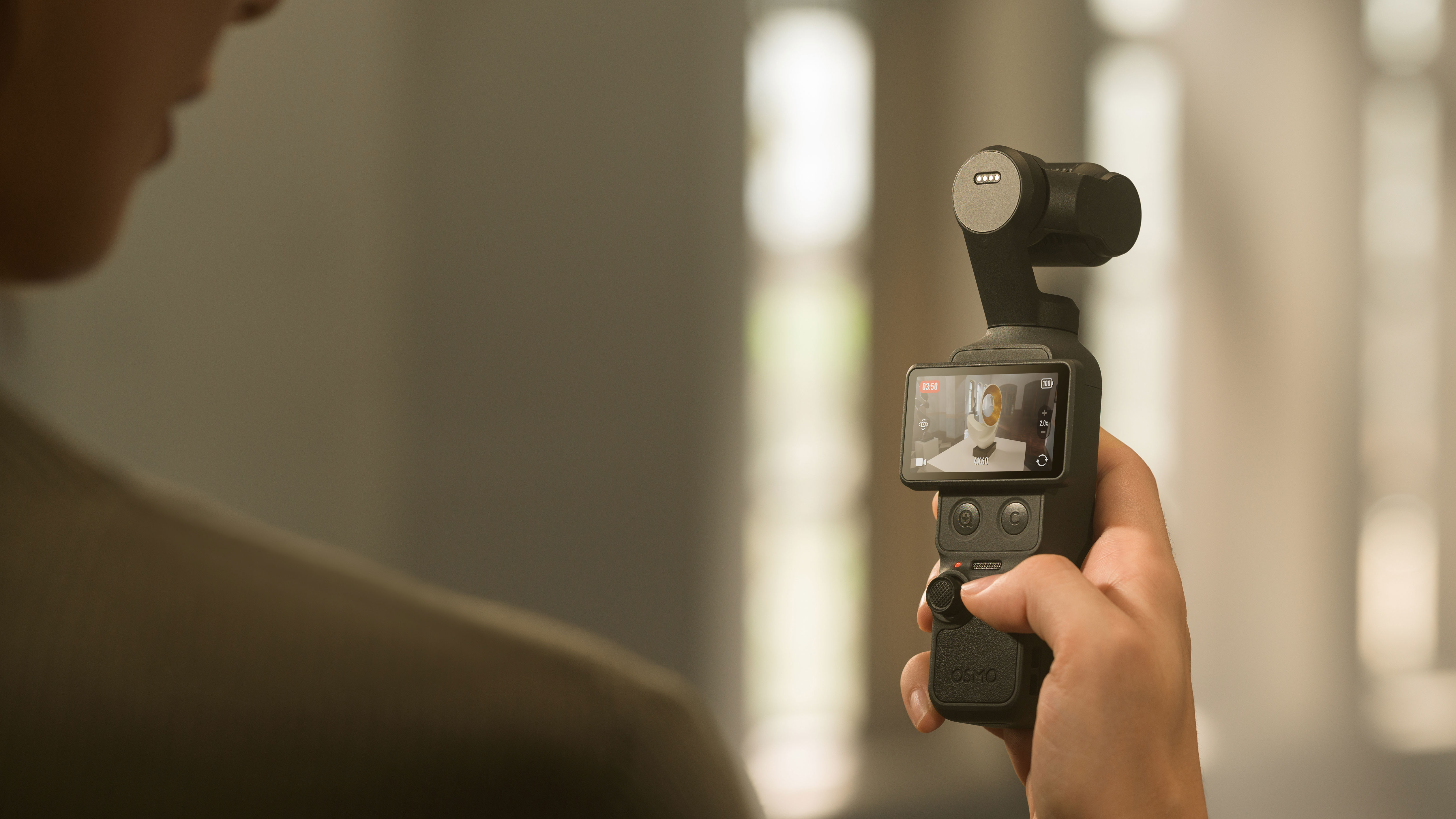 DJI Osmo Pocket 4 in hand