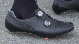 The shoes feature two Boa dials and perforated holes down the body of the shoe