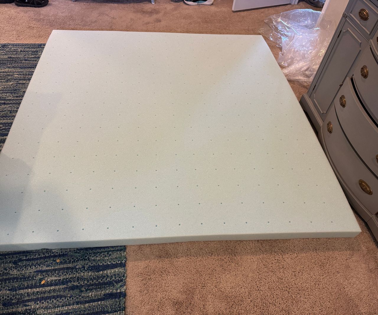 Lucid mattress topper being unboxed and tested for a review