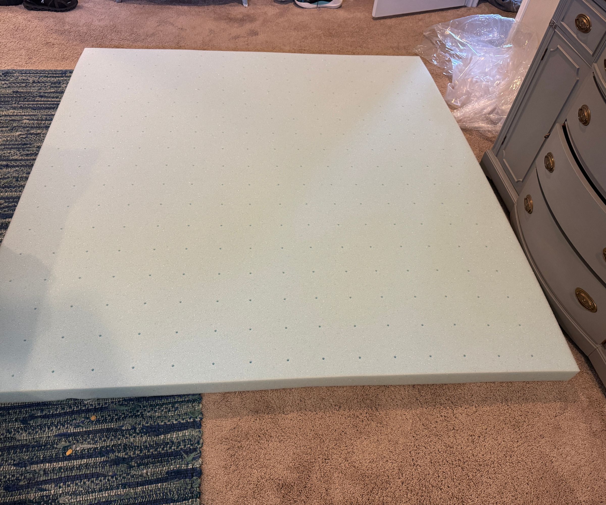 Lucid mattress topper being unboxed and tested for a review