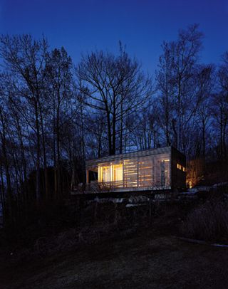 Exterior of Sunset Cabin by Taylor_Smyth Architects, Toronto at night