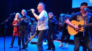 (from left) Honoree Emmylou Harris, Jackson Browne, Bruce Springsteen, Patti Scialfa and Tom Morello onstage at the 2025 American Music Honors
