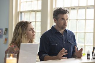 Ashley (Harriet Dyer) and Gordon (Patrick Brammall) stand at the reception desk in the veterinary surgery. Gordon has the sides of his hands resting on the desk, as though pleading his case