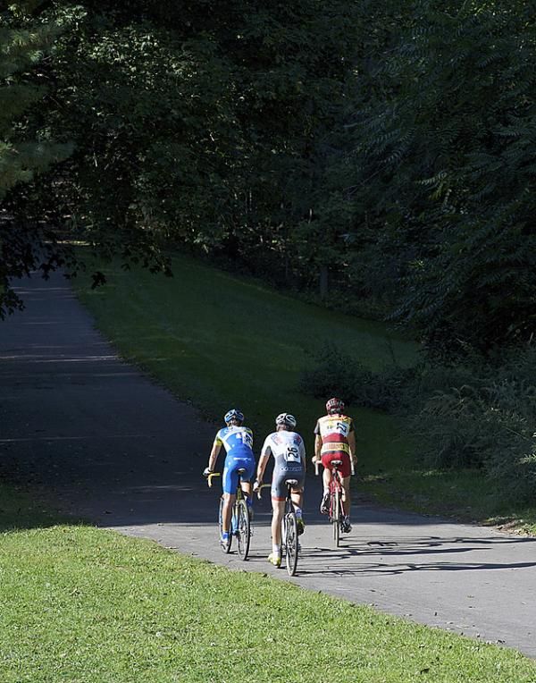 By the penultimate trip down the back paved section of the course the podium was set.