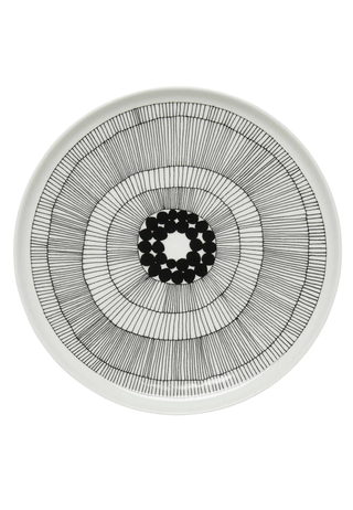 white plate with a black line design of circles and lines