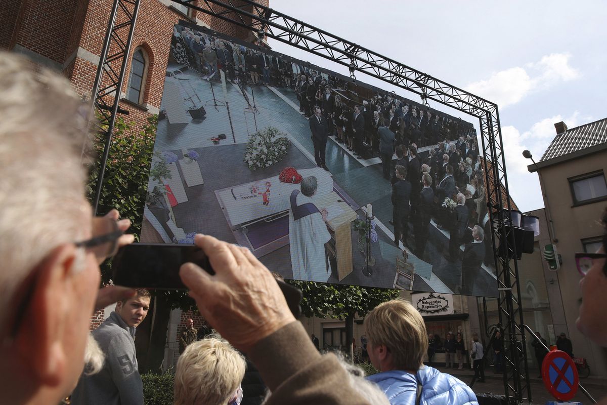 A large crowd was able to watch the service on a big screen outside the church