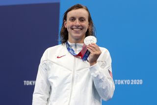 Katie Ledecky of Team United States poses with the silver medal for the Women's 400m Freestyle Final on day three of the Tokyo 2020 Olympic Games