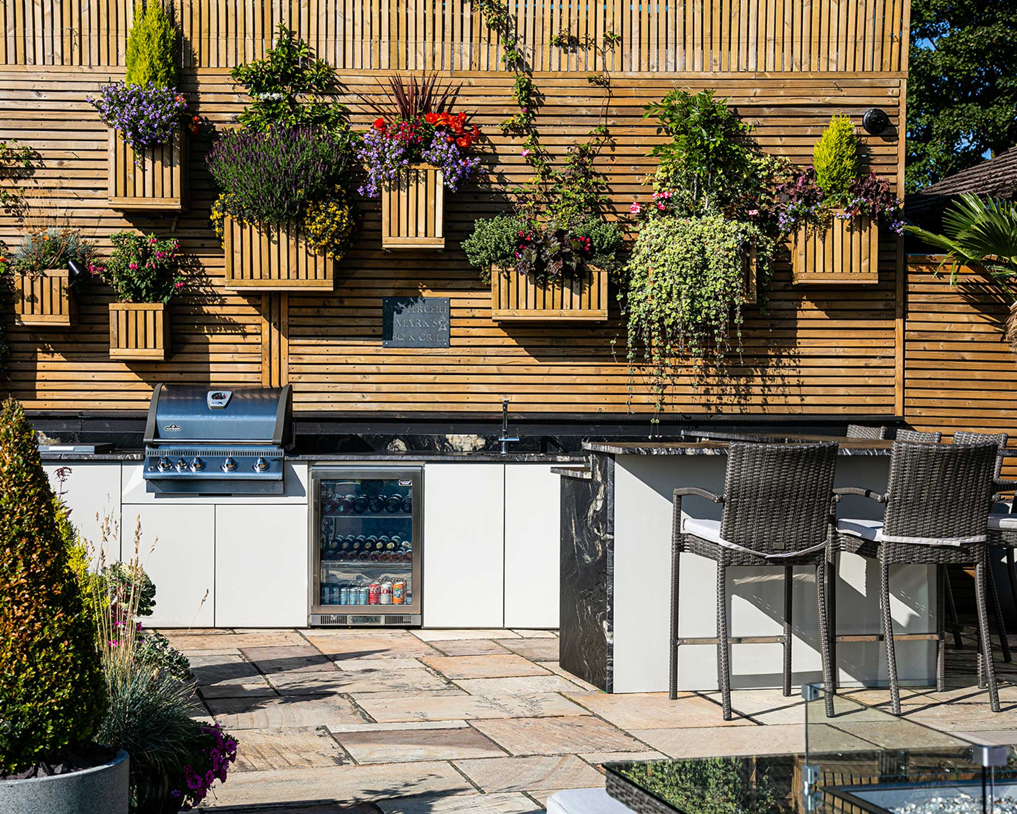 outdoor grill station with planters overhead from CENA outdoors