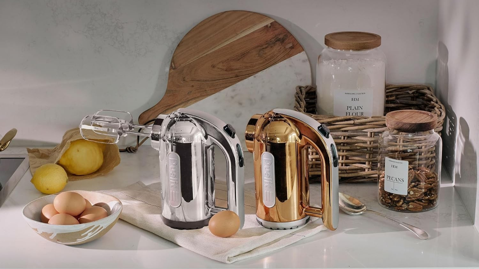 Dualit Hand Mixer on the counter in a kitchen around baking