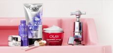 OLAY skincare products displayed on a table