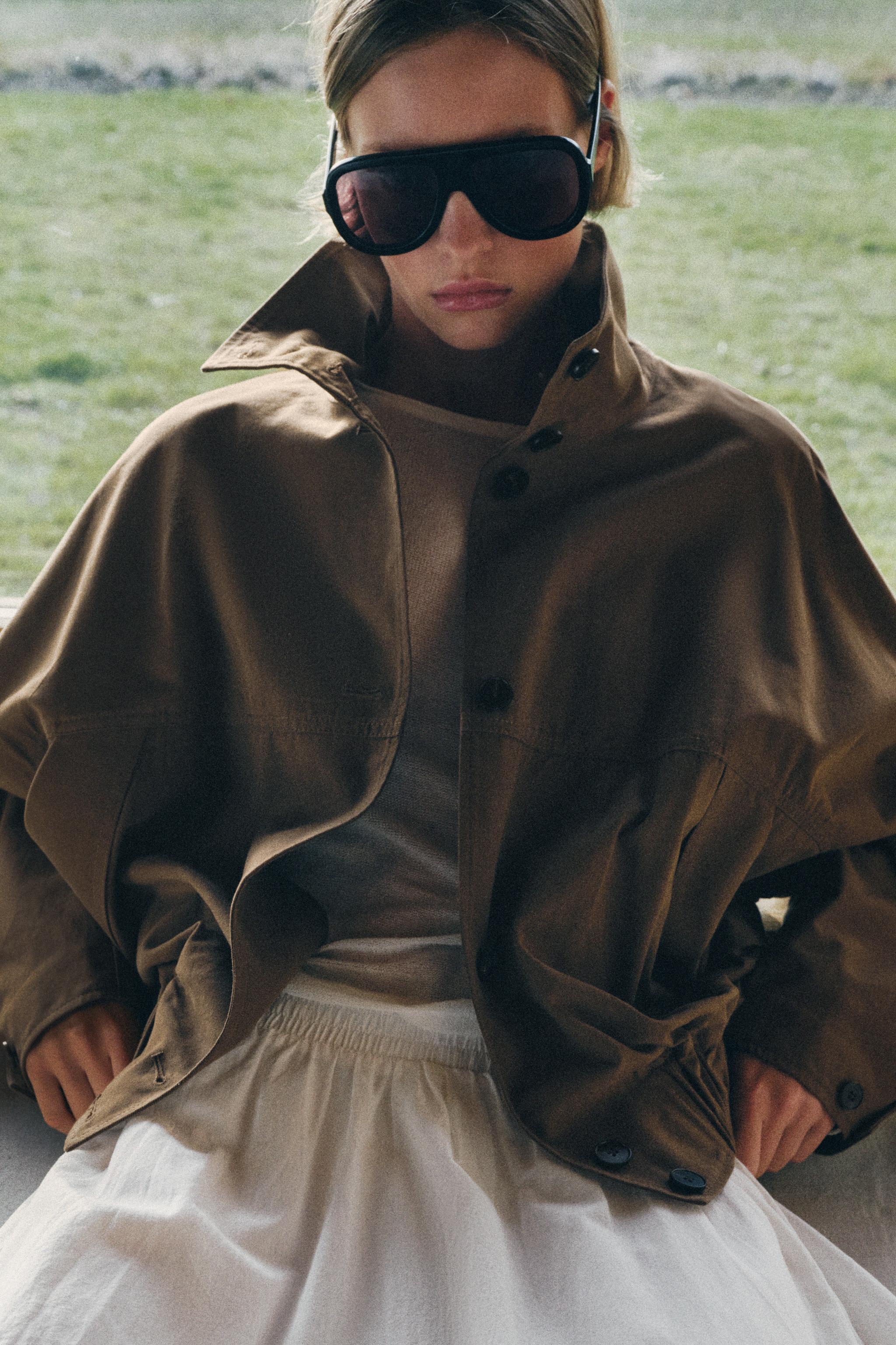 High Neck Jacket With Elasticated Hem