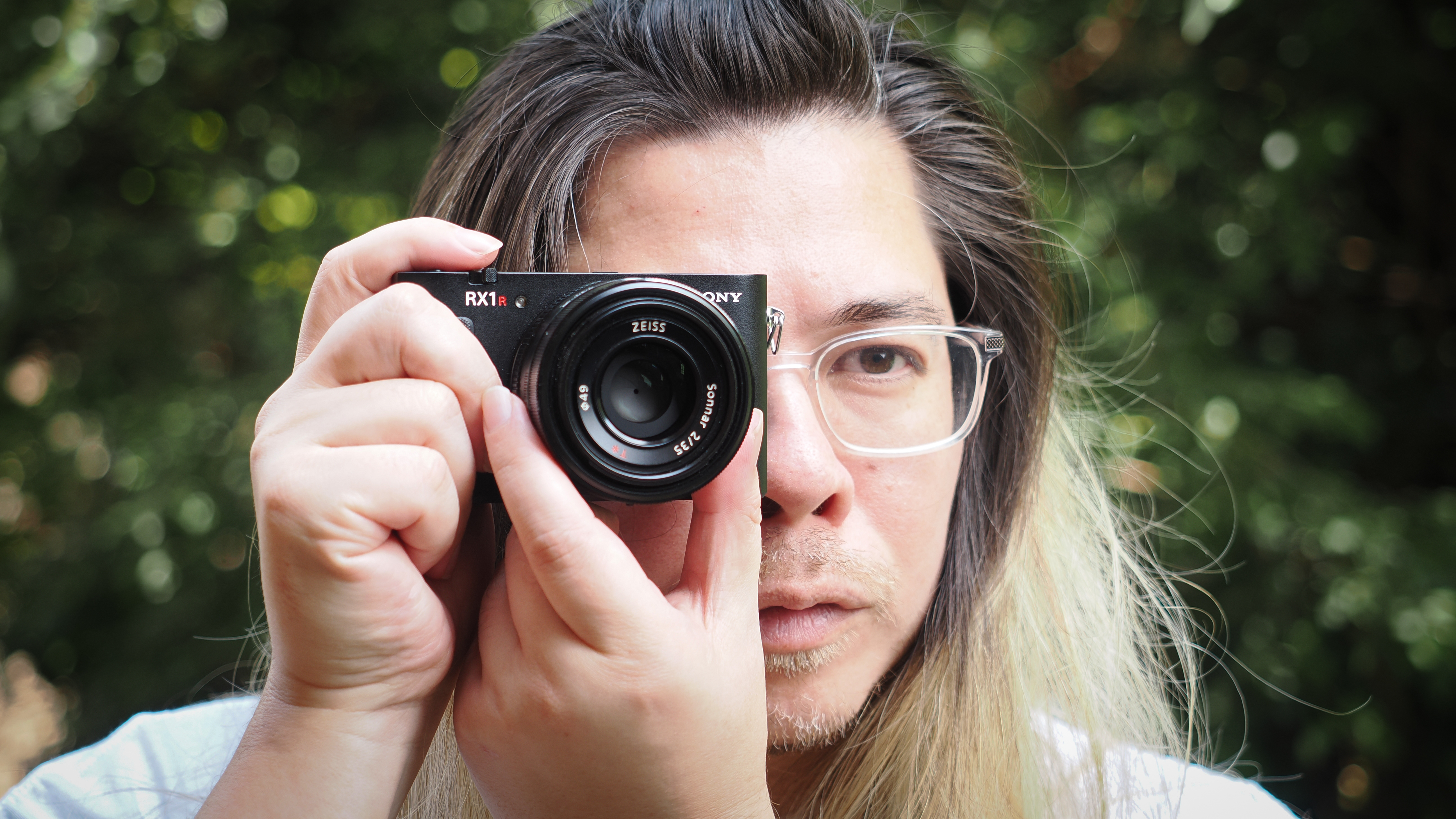 Photographer James Artaius holding the Sony RX1R III camera outdoors