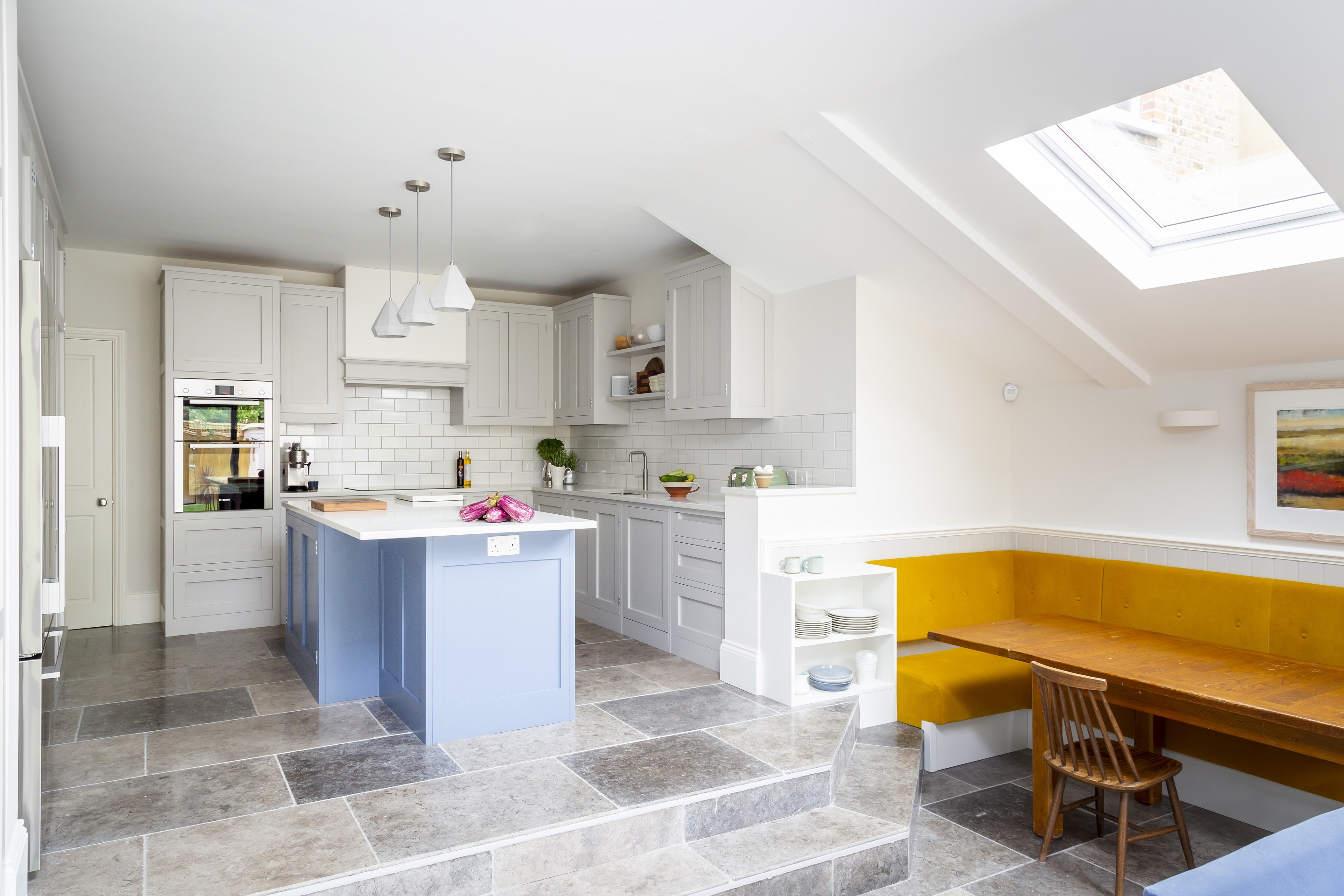 small open plan kitchen with bench seat