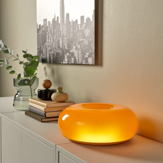IKEA LED table/wall doughnut lamp in orange from the new VARMBLIXT collection