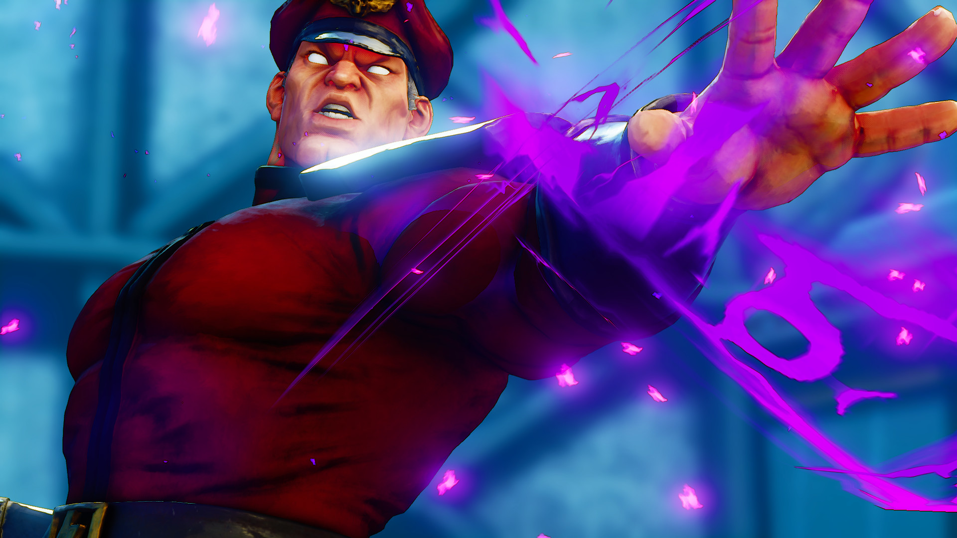 Street Fighter 5 screenshot of M Bison who wears a red outfit and hat and is raising his arm