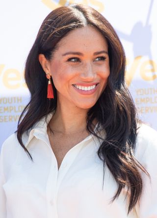Meghan, Duchess of Sussex accompanied by Prince Harry, Duke of Sussex visit the Tembisa Township to learn about Youth Employment Services during their royal tour of South Africa on October 02, 2019 in Johannesburg, South Africa