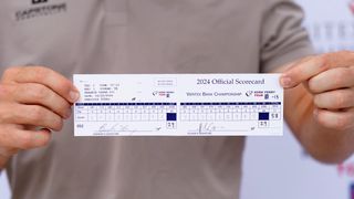 Frankie Capan III holds his scorecard after his 58 at the Veritex Bank Championship in Texas