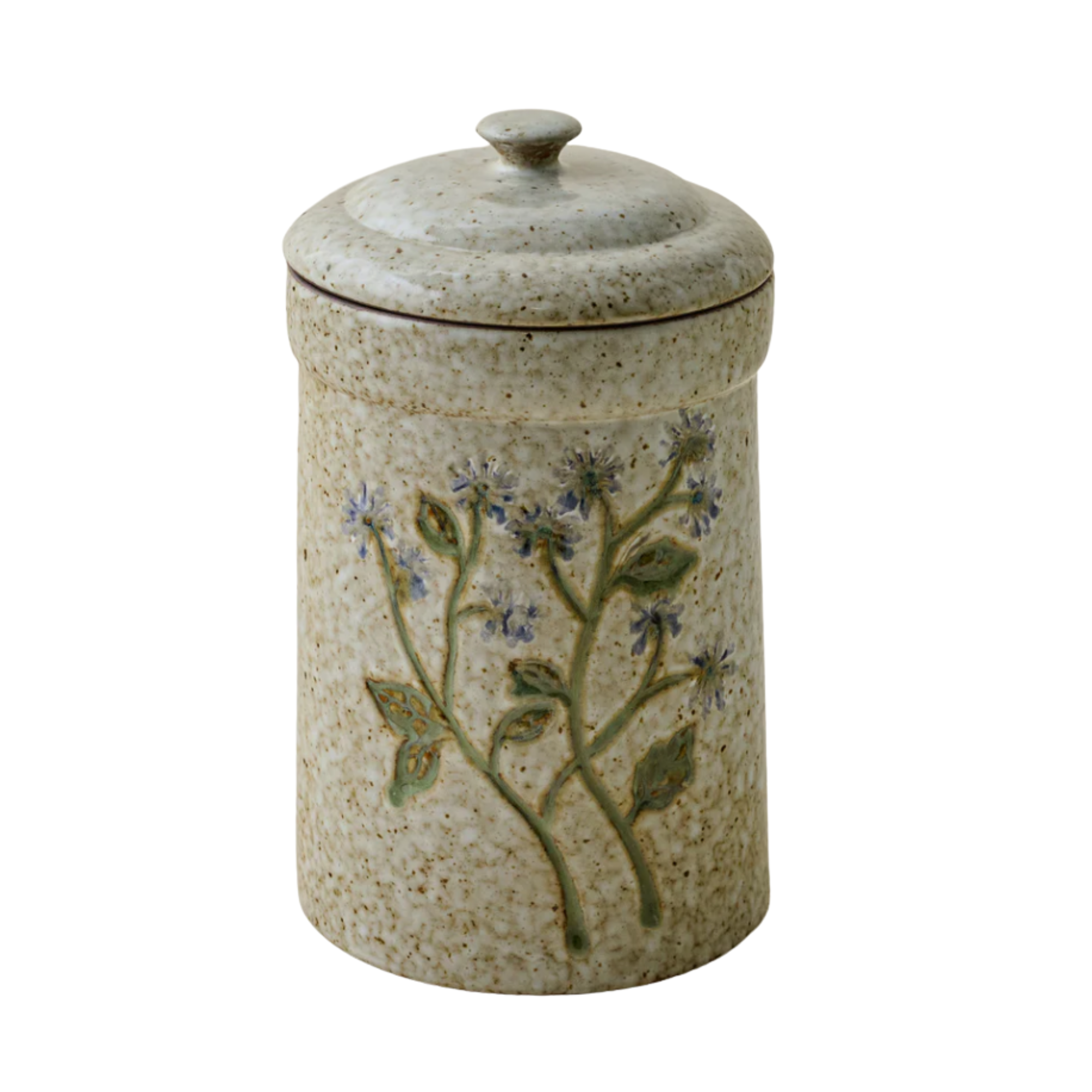 a small storage canister with a floral motif on the exterior