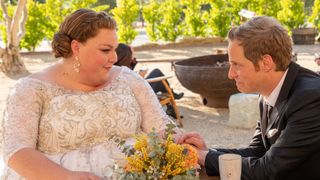 Chrissy Metz in a wedding dress across from Chris Geere in This Is Us