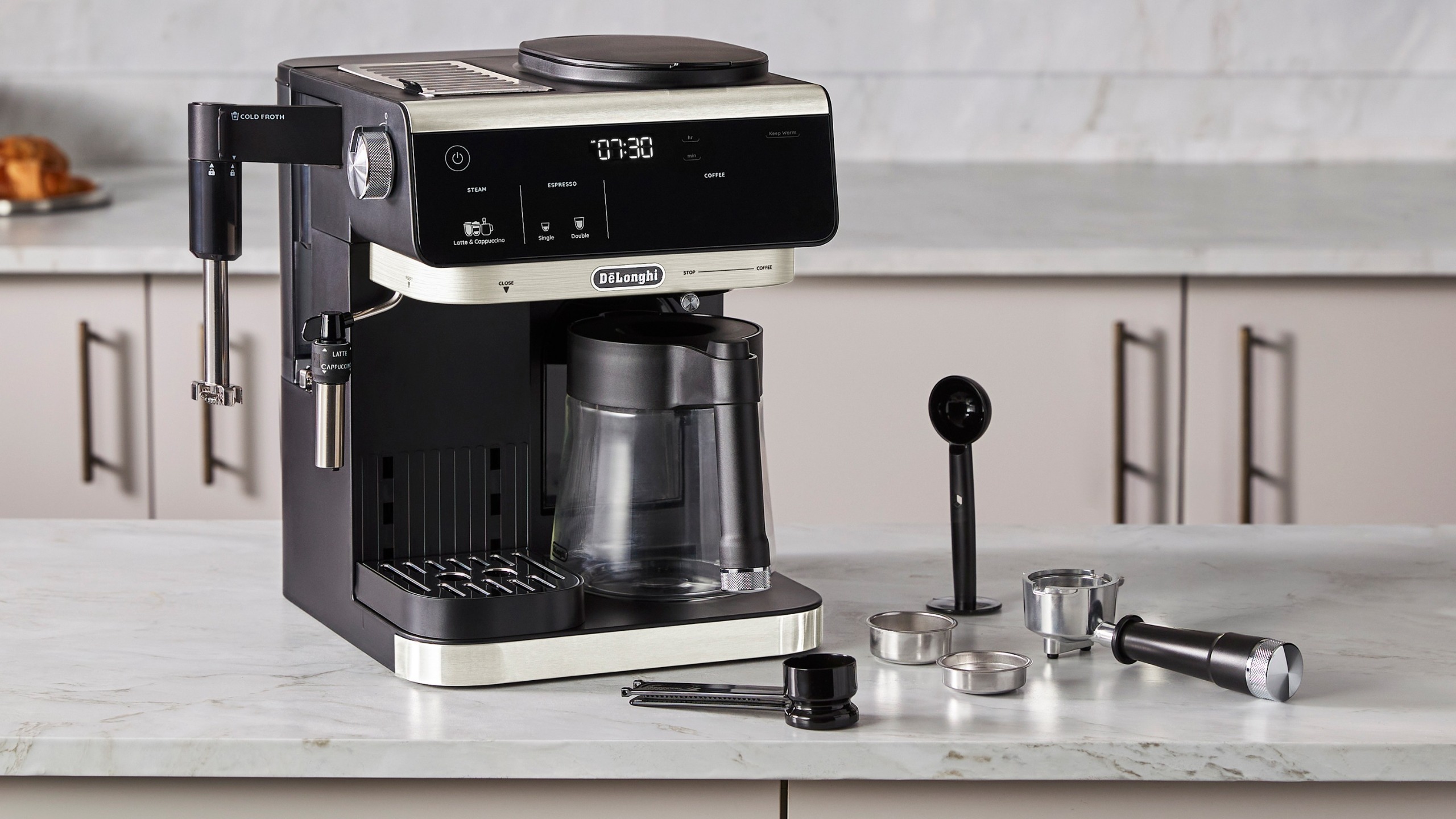 De'Longhi All-in-One Combination Coffee &amp; Espresso Machine with accessories on kitchen counter