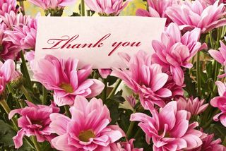 A thank you note with flowers.