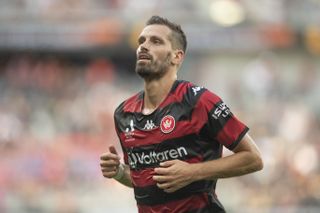 Morgan Schneiderlin in action for Western Sydney Wanderers against Central Coast Mariners in March 2023.