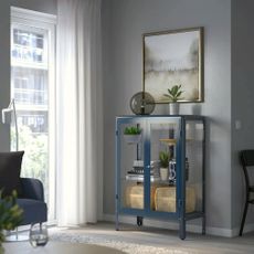 Dark blue metal and glass cabinet