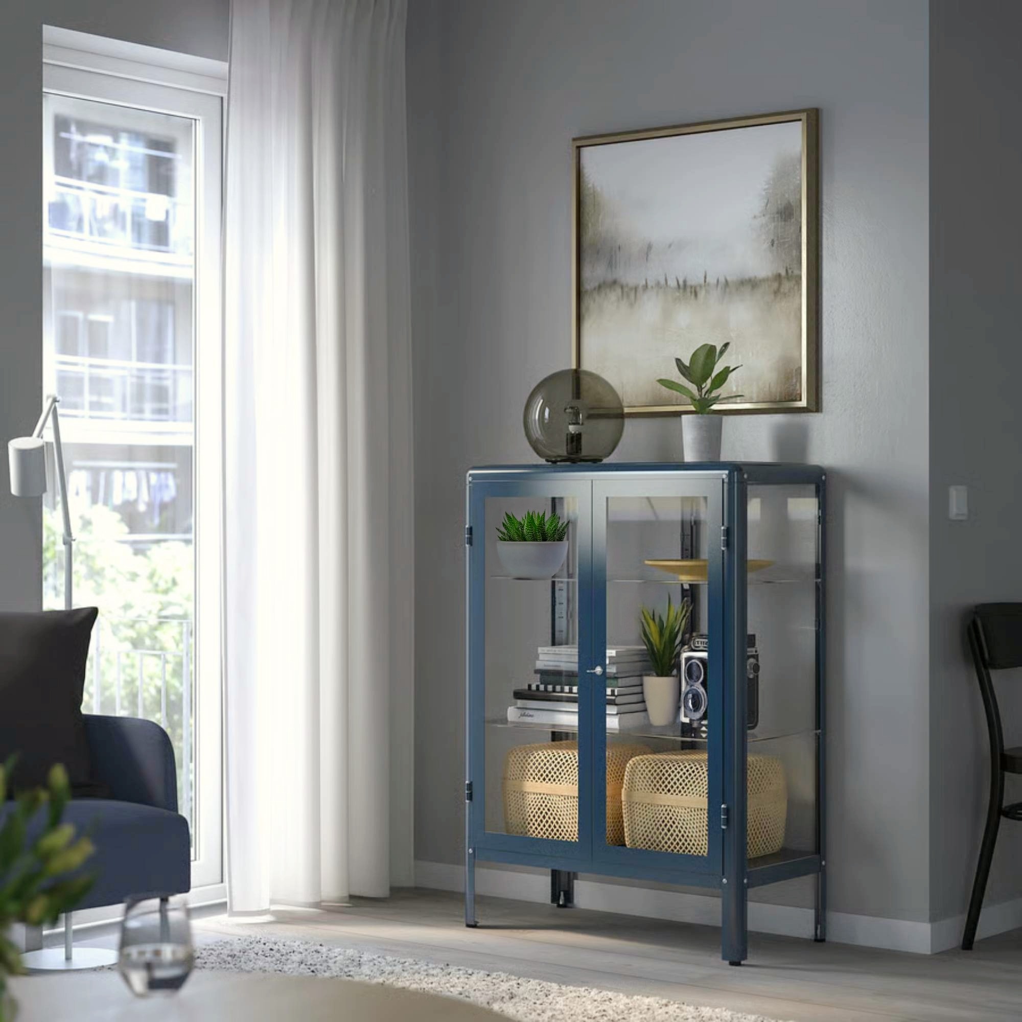 Dark blue metal and glass cabinet