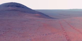 This June 2017 view from the Pancam on NASA's Opportunity Mars rover shows the area just above "Perseverance Valley" on the western rim of Endeavour Crater. Color has been enhanced to make differences in surface materials easier to see.