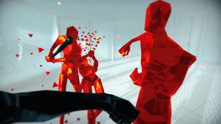 best VR games: two fully red attackers approaching the player, whose fist is swinging