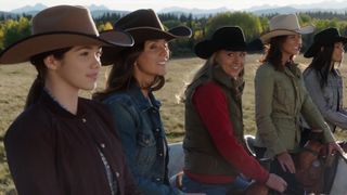 Ladies line up on the backs of horses in Heartland