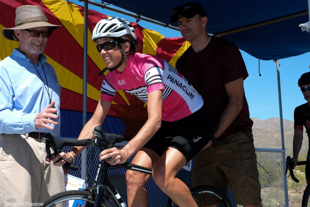 A Panache rider gets the countdown from the official starter