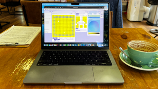 Bitsy on a MacBook Pro 2021 14-inch in a coffee house
